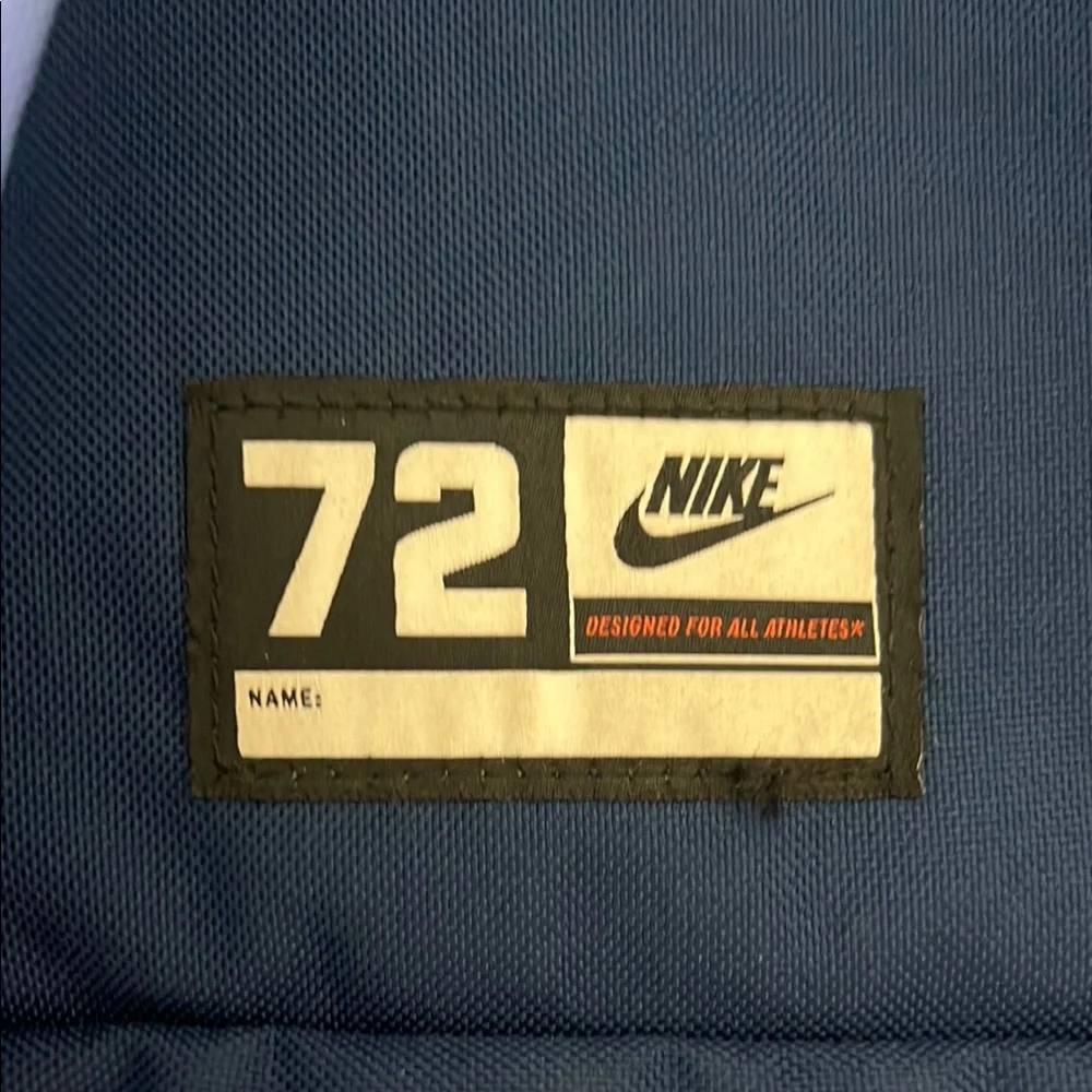 Perfect Mid-Sized Backpack Blue, Purple and Orange nike double zip